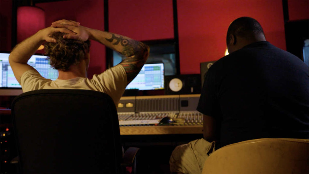 Two people in a recording studio